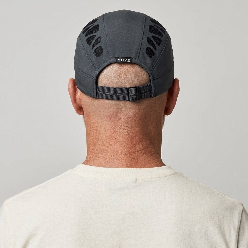 A man wearing the Aeromesh Evo Cap from the back: the strap and the metal slide buckle