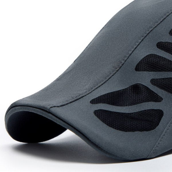 The curved front of the cap, side view