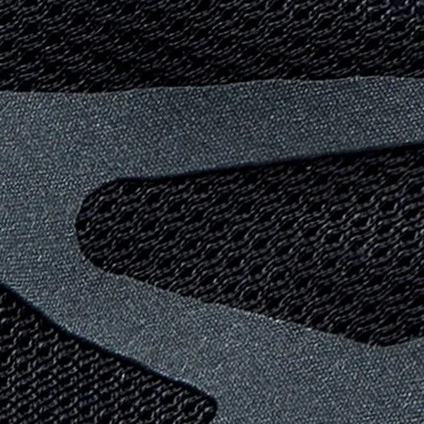 Macro of one cutout: the AirLeaf mesh vent inside it